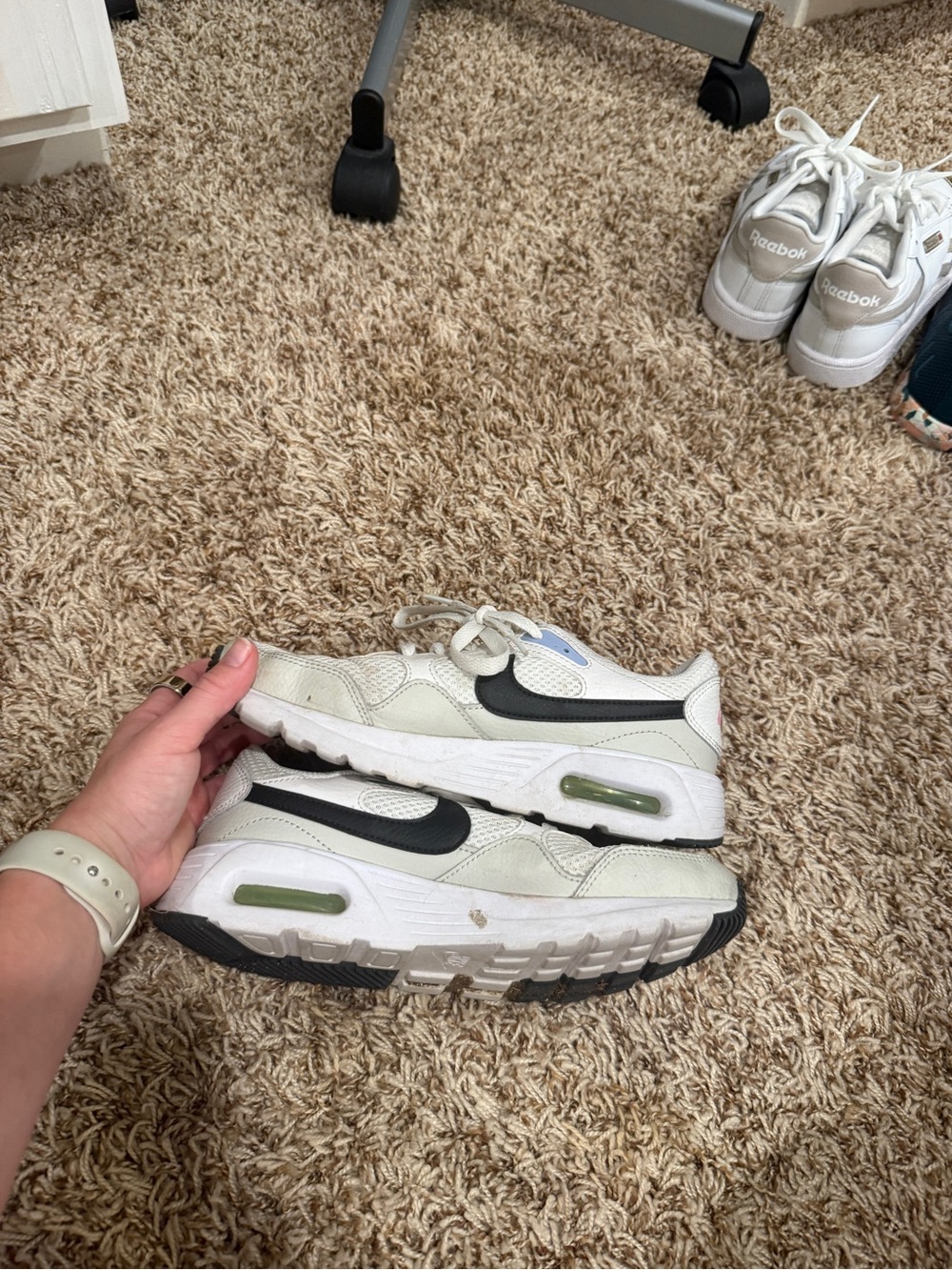 Nike White Sneakers with Black Swoosh and Green Air Accent